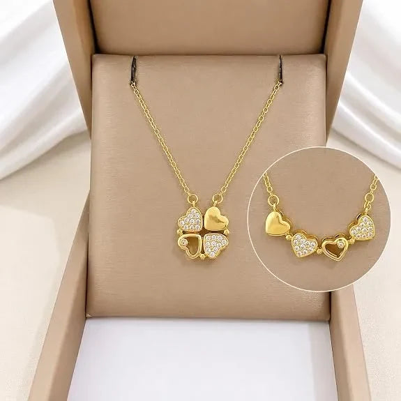 Heart clover pendant necklace in a gift box, with an inset of the hearts apart