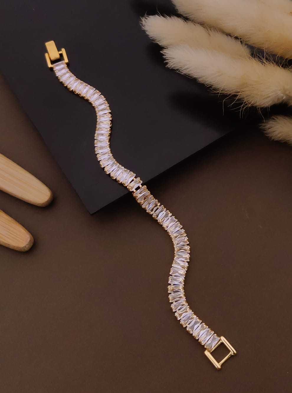 Baguette CZ Tennis Bracelet in Gold Tone