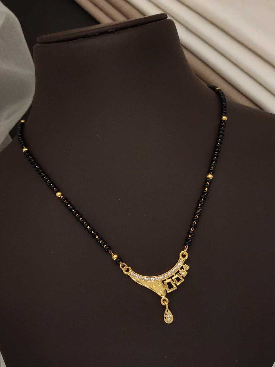 Black Bead Mangalsutra with Peacock Wing AD Pendant