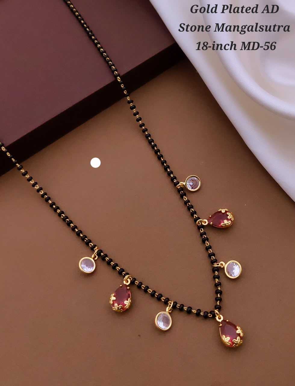 Black Bead Mangalsutra with Teardrop and Round AD Stone Charms