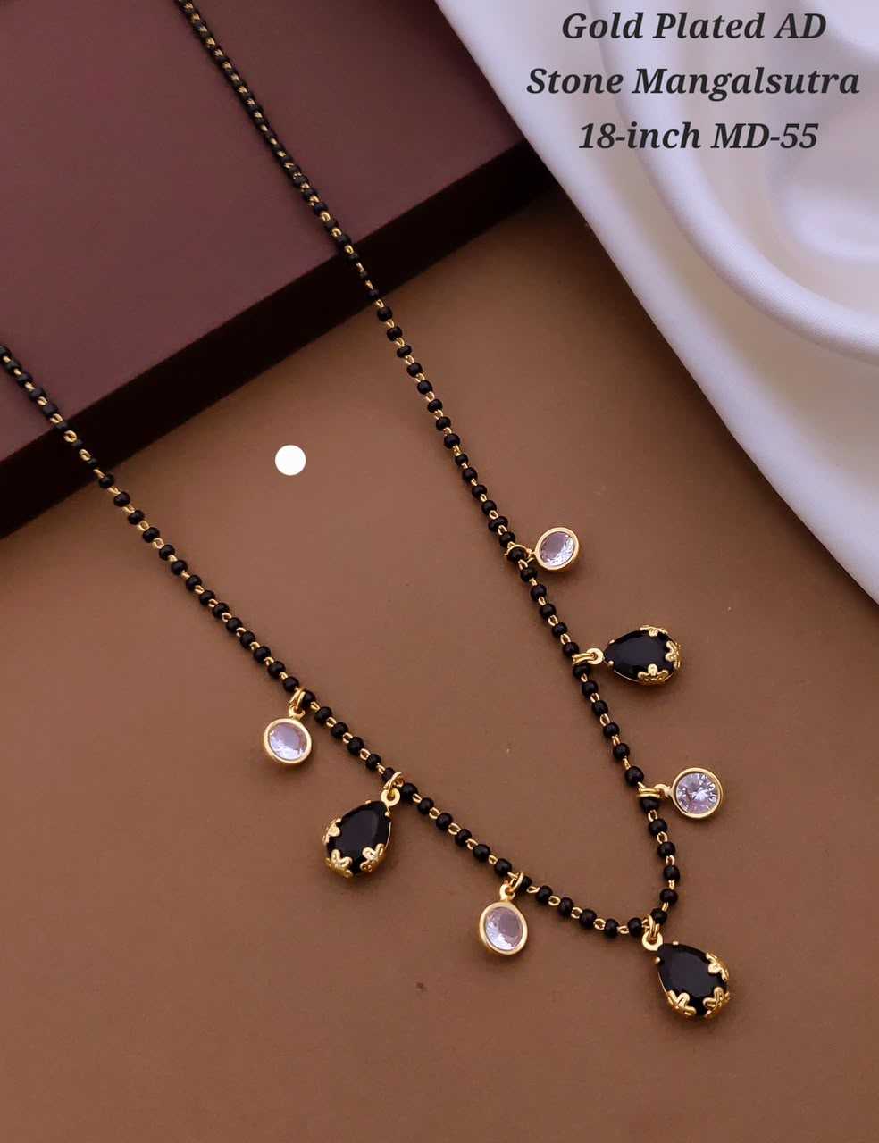 Black Bead Mangalsutra with Teardrop and Round AD Stone Charms