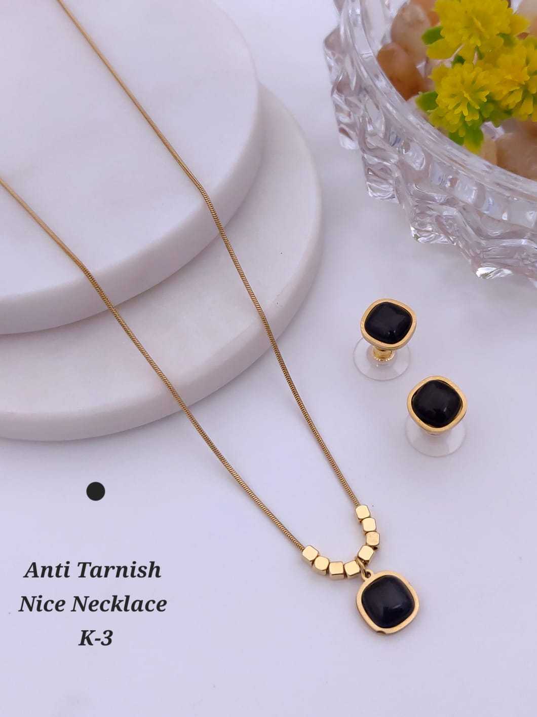 Carved Pendant Set on Gold Bead Chain