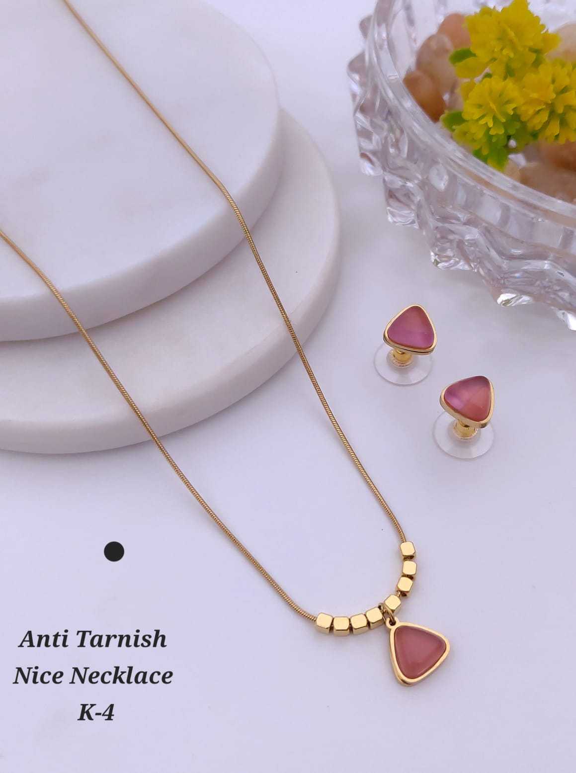Carved Pendant Set on Gold Bead Chain