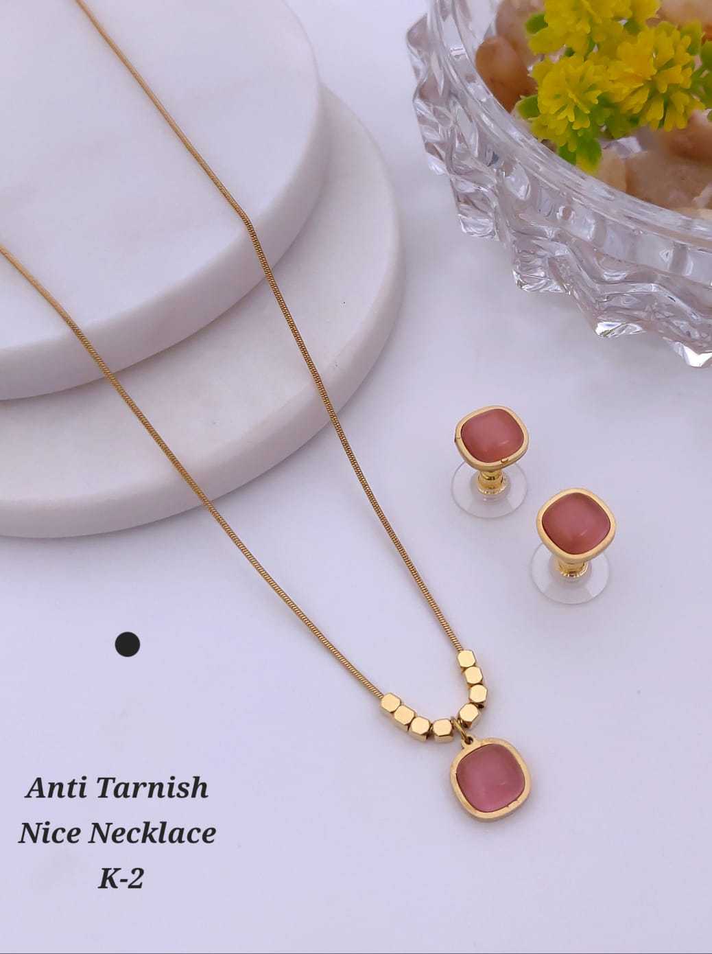 Carved Pendant Set on Gold Bead Chain