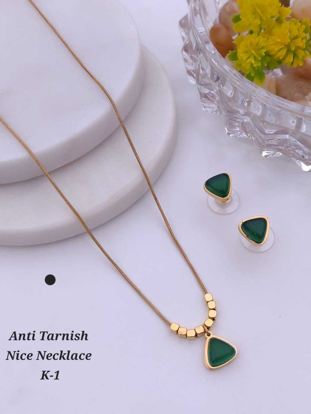 Carved Pendant Set on Gold Bead Chain