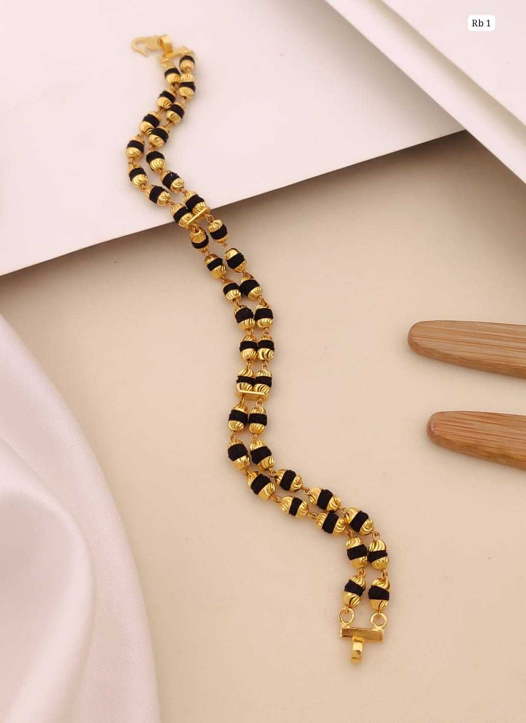 Double Strand Rudraksha Bracelet with Gold Caps