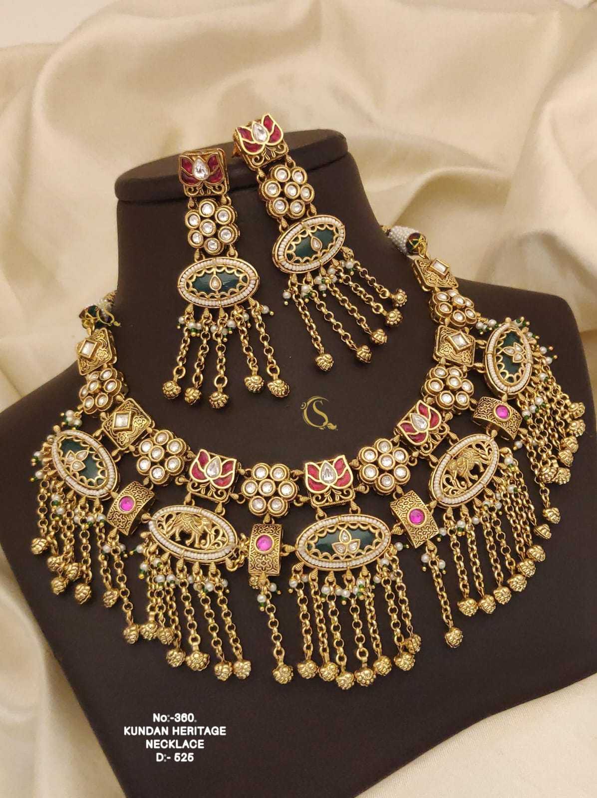 Elephant Panel Kundan Bib Necklace Set with Pink Lotus Stones