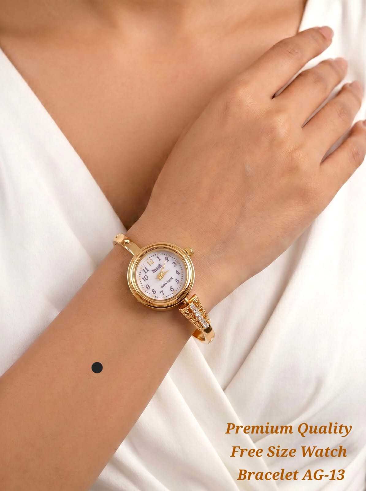 Gold Bangle Watch with Filigree Charm