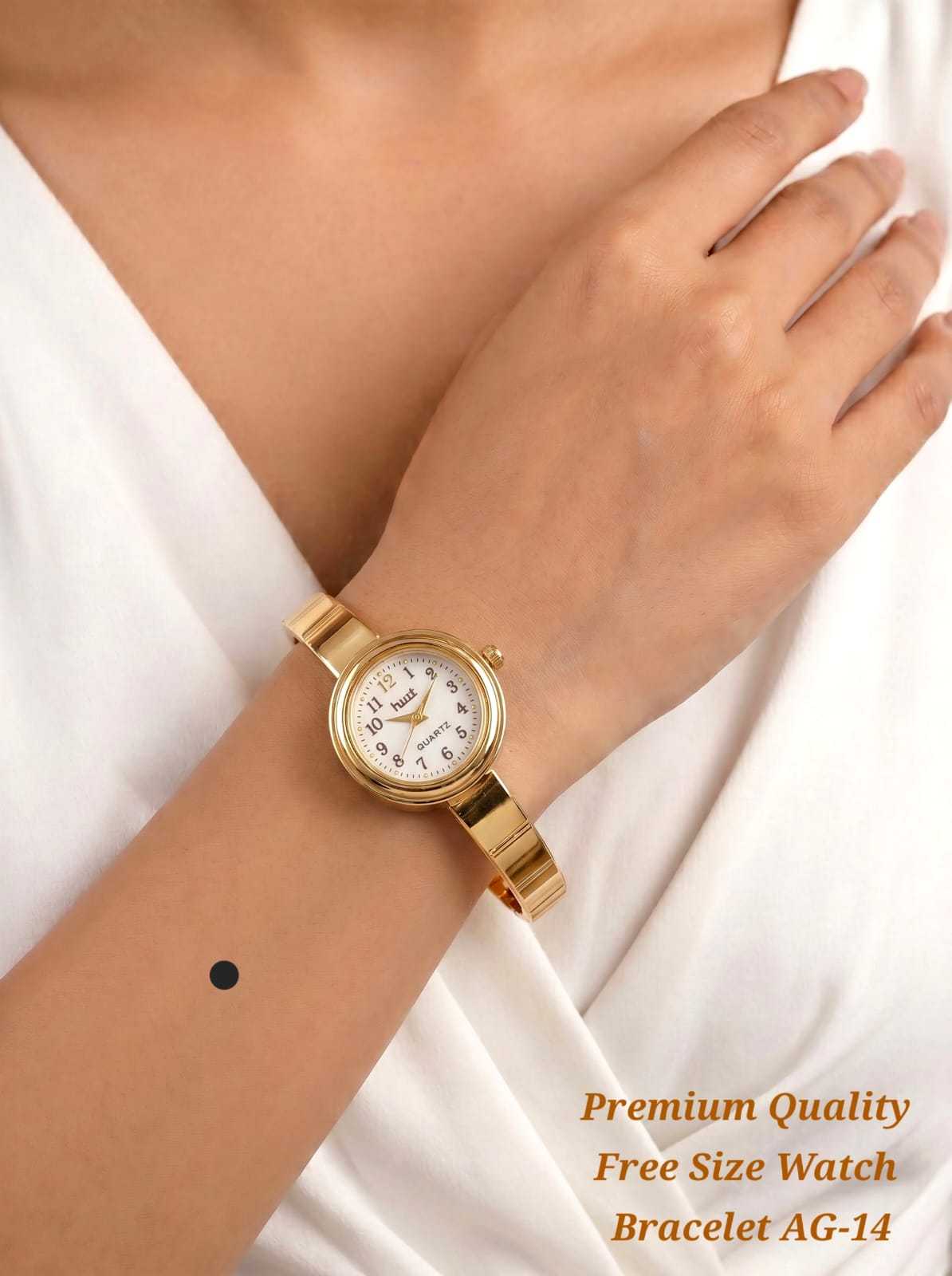 Gold Bangle Watch with Filigree Charm