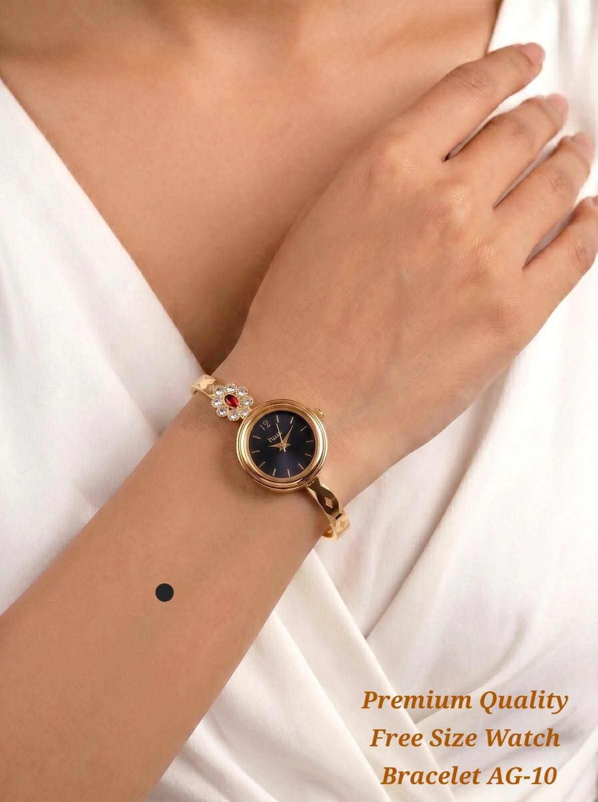 Gold Bangle Watch with Filigree Charm