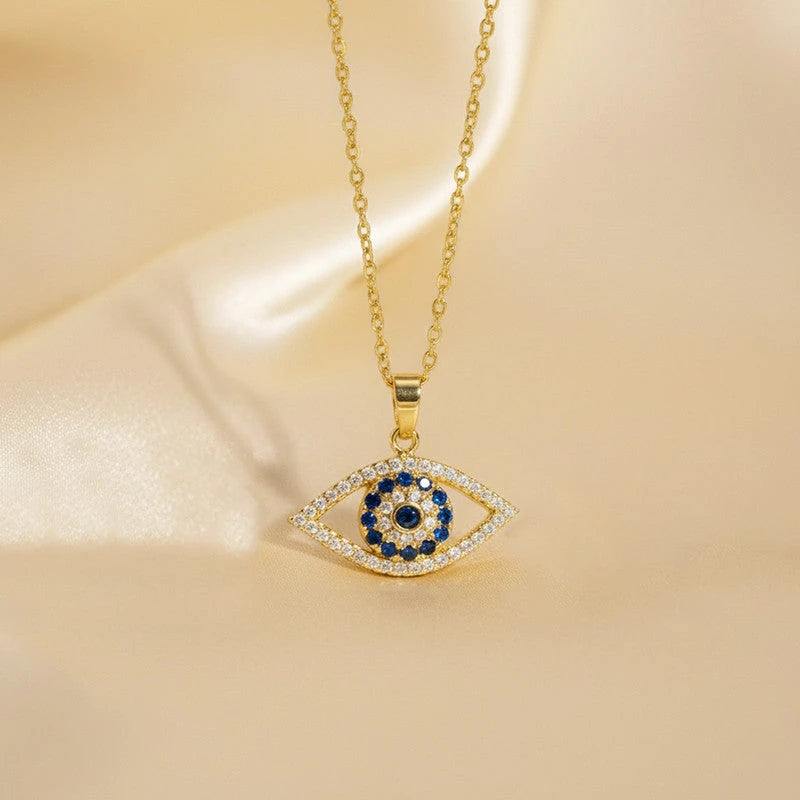 American diamond evil eye pendant on cream silk