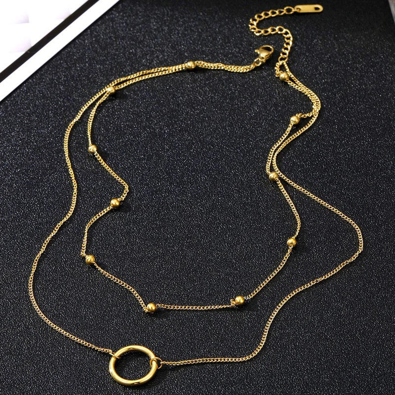 Full necklace laid flat showing the lobster clasp and extender