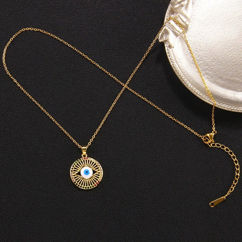 Full chain with extender and lobster clasp laid flat on black