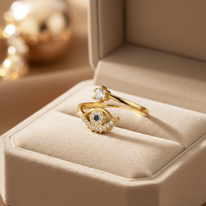 Evil eye ring standing in a velvet ring box