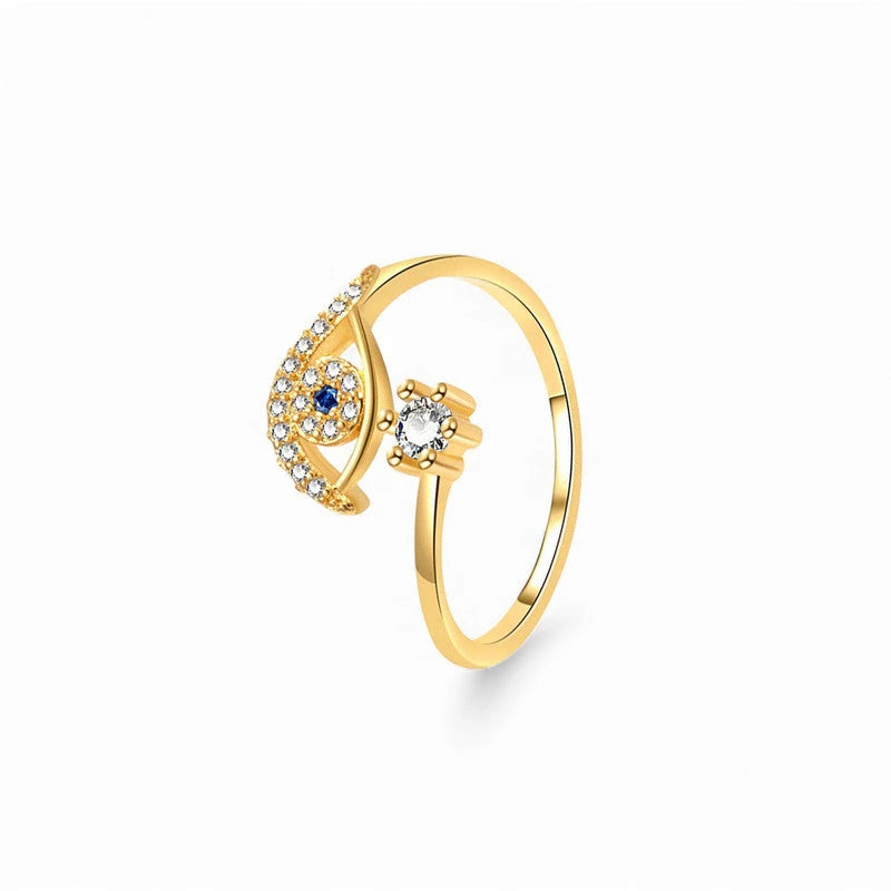 Evil eye ring on a plain white background