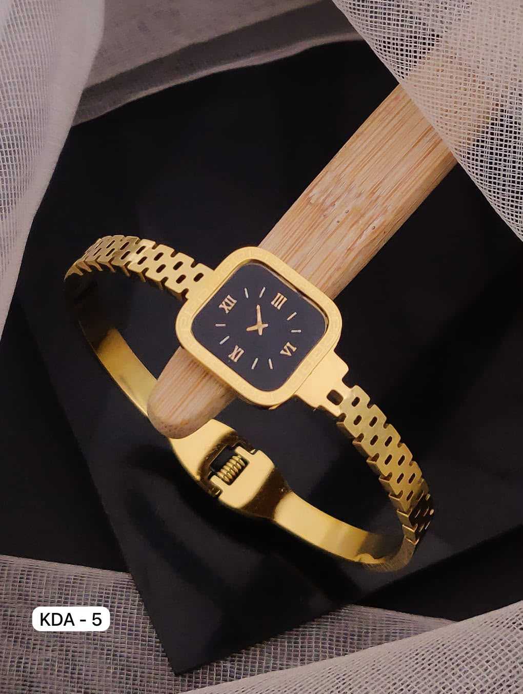 Gold-Tone Bangle Watch with Black Dial and Roman Numerals