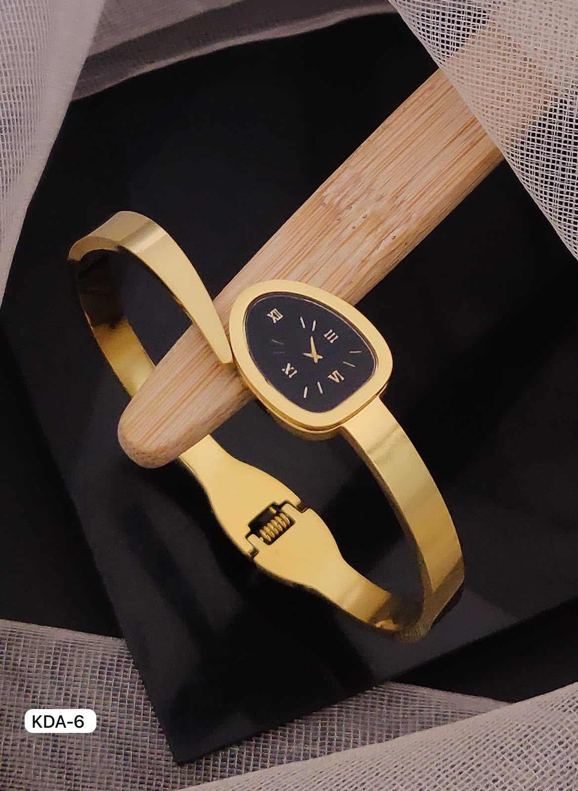 Gold-Tone Bangle Watch with Black Dial and Roman Numerals