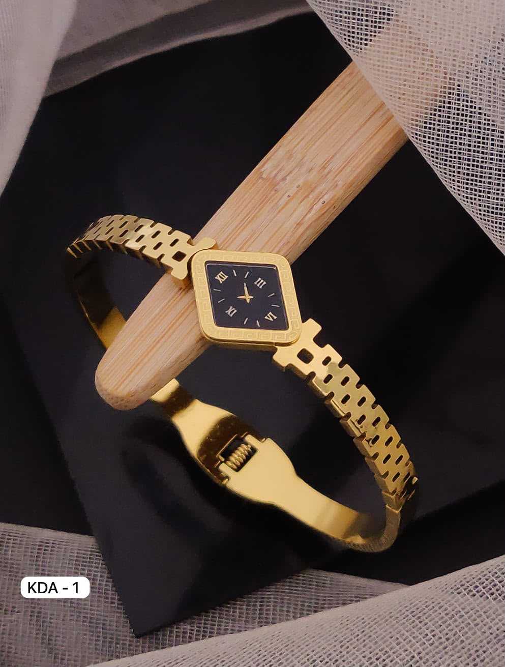 Gold-Tone Bangle Watch with Black Dial and Roman Numerals