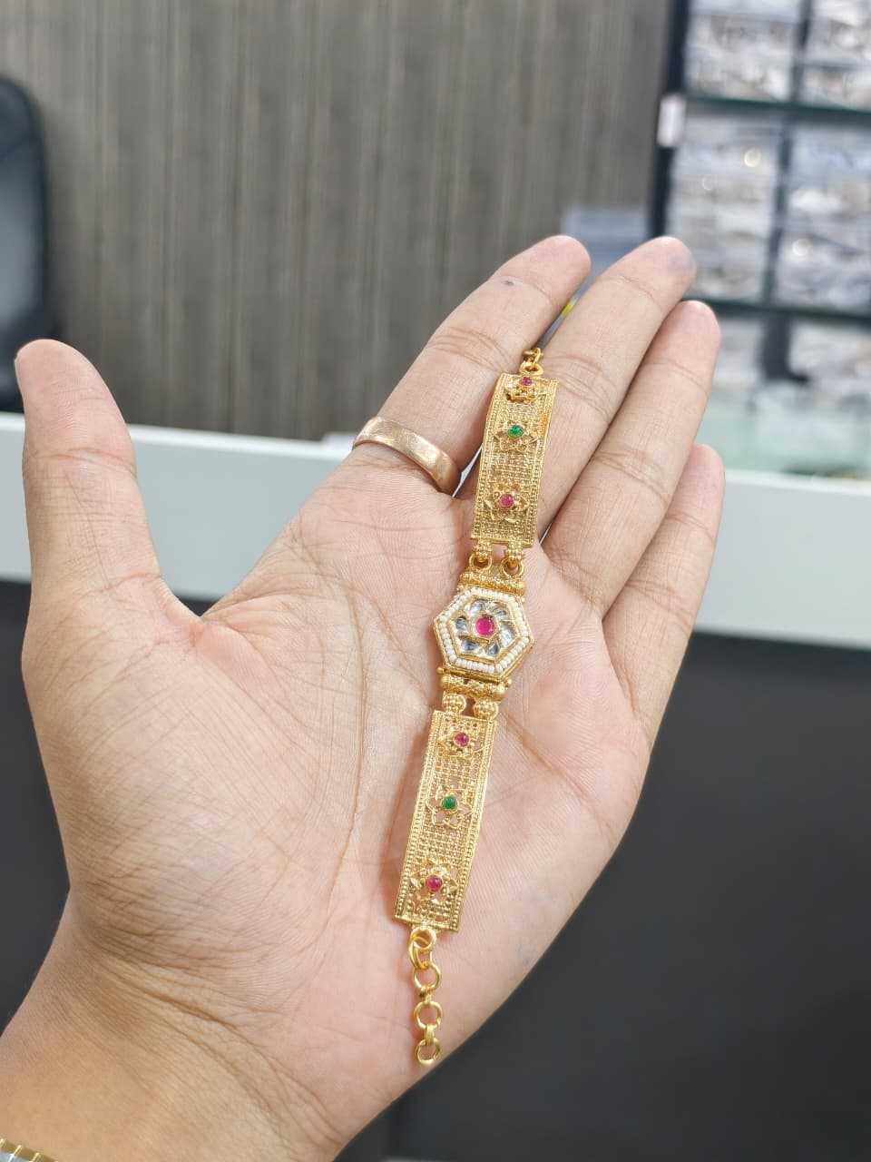 Kundan Hexagon Bracelet with Jaali Panels and Ruby-Green Stones