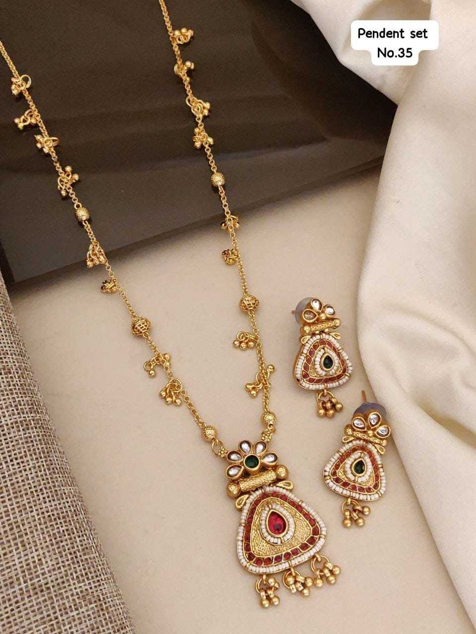 Long Ghungroo Chain Pendant Set with Kundan and Ruby Stones