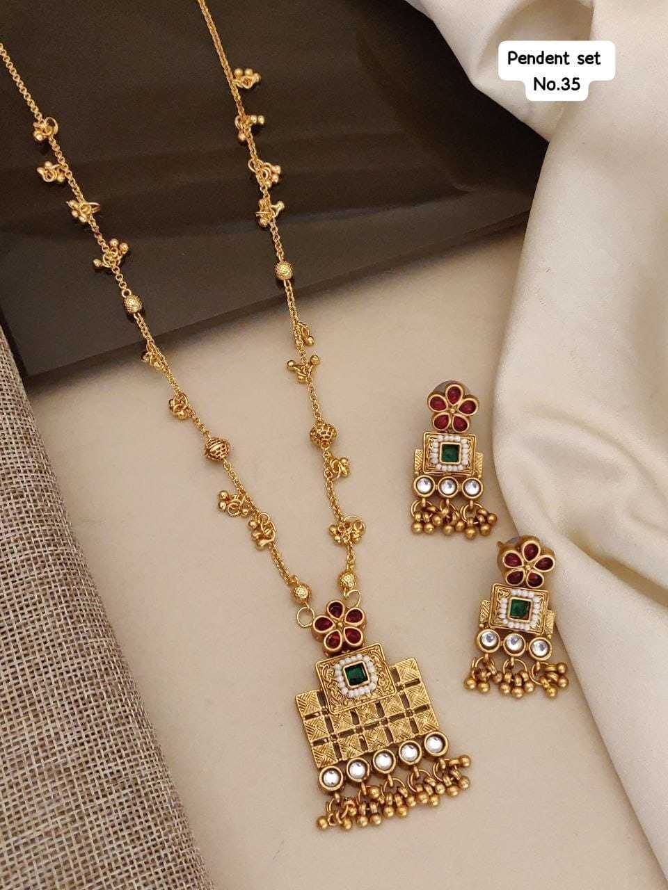Long Ghungroo Chain Pendant Set with Kundan and Ruby Stones