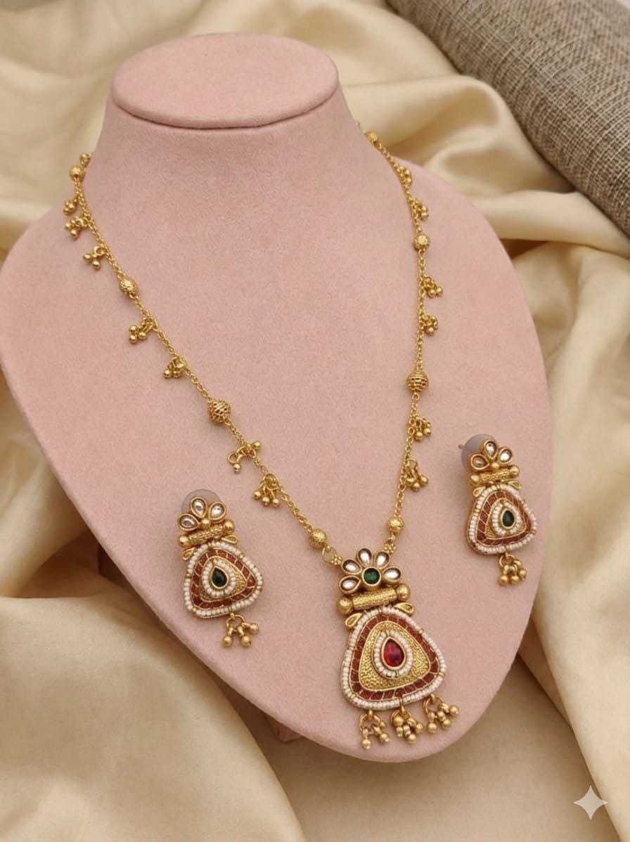 Long Ghungroo Chain Pendant Set with Kundan and Ruby Stones