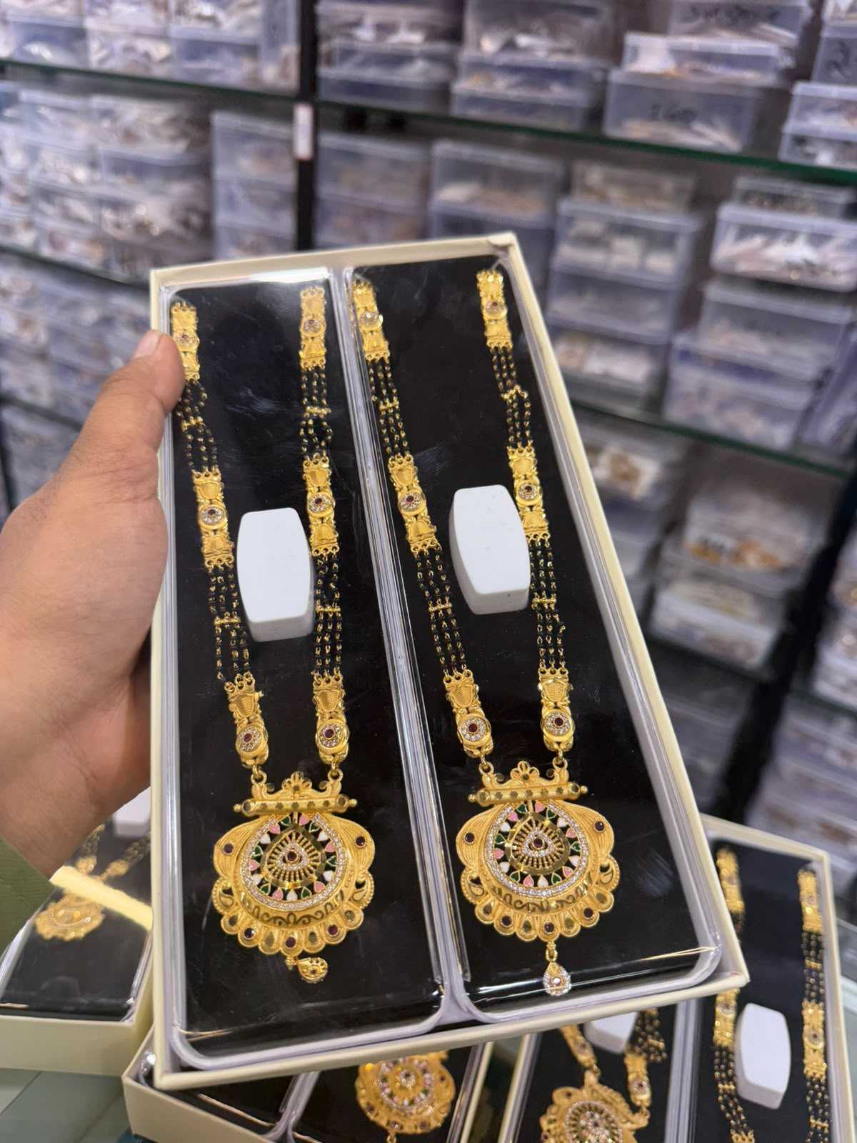 Multi-Strand Black Bead Long Mangalsutra with Filigree Gold Pendant
