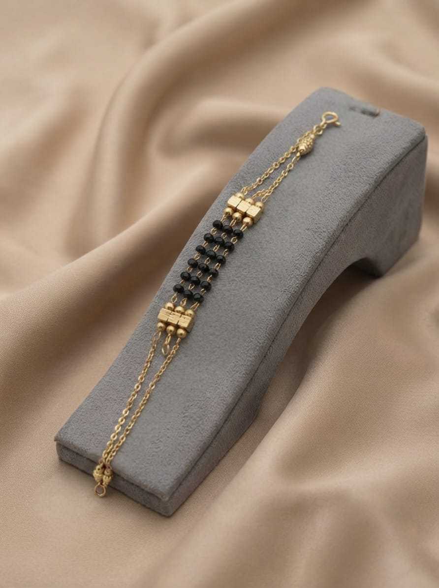 Multi Strand Bracelet with Gold Barrel Stations