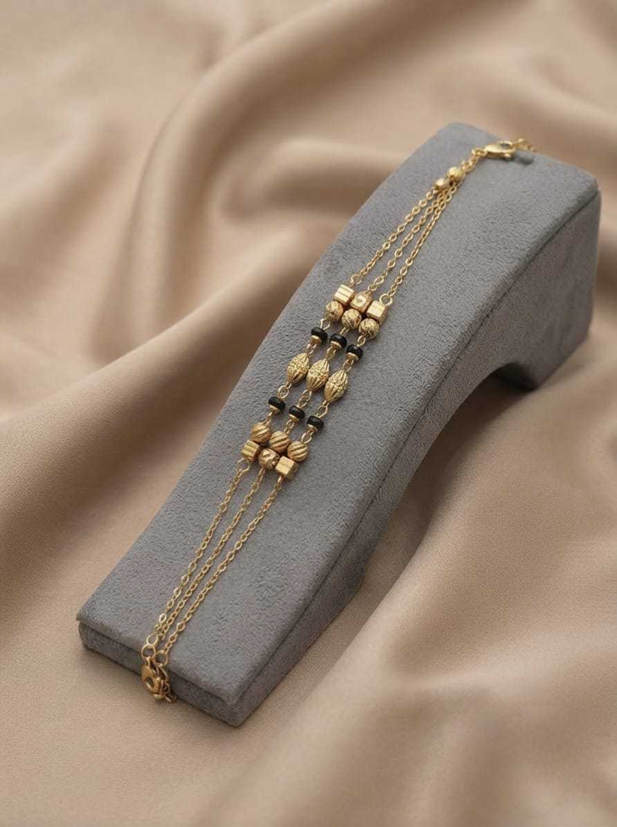 Multi Strand Bracelet with Gold Barrel Stations