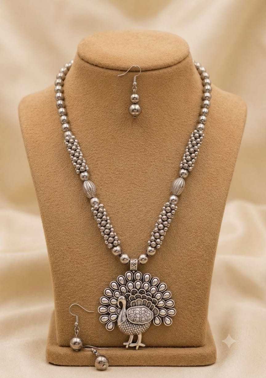 Oxidised Beaded Long Pendant Set with Peacock and Radha Krishna Motifs