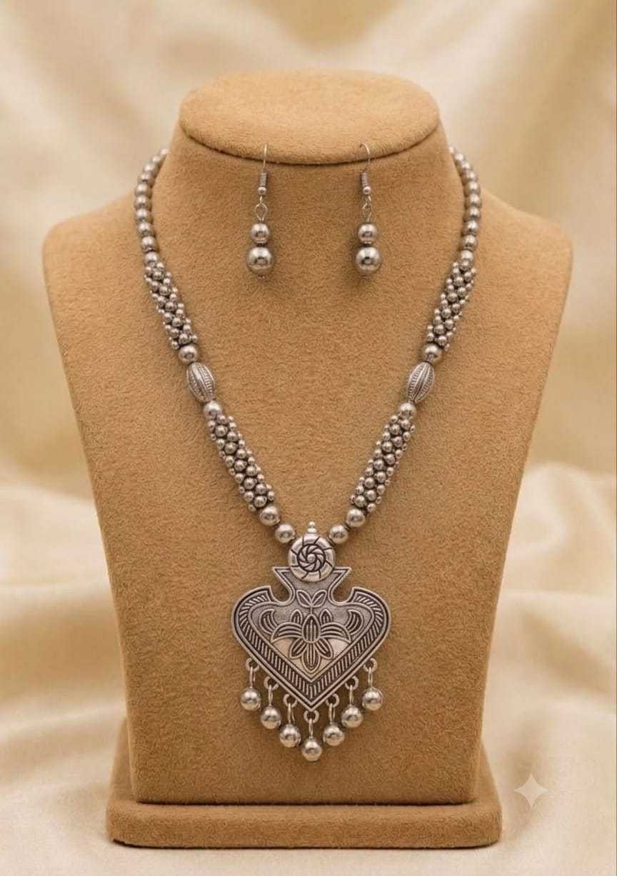 Oxidised Beaded Long Pendant Set with Peacock and Radha Krishna Motifs