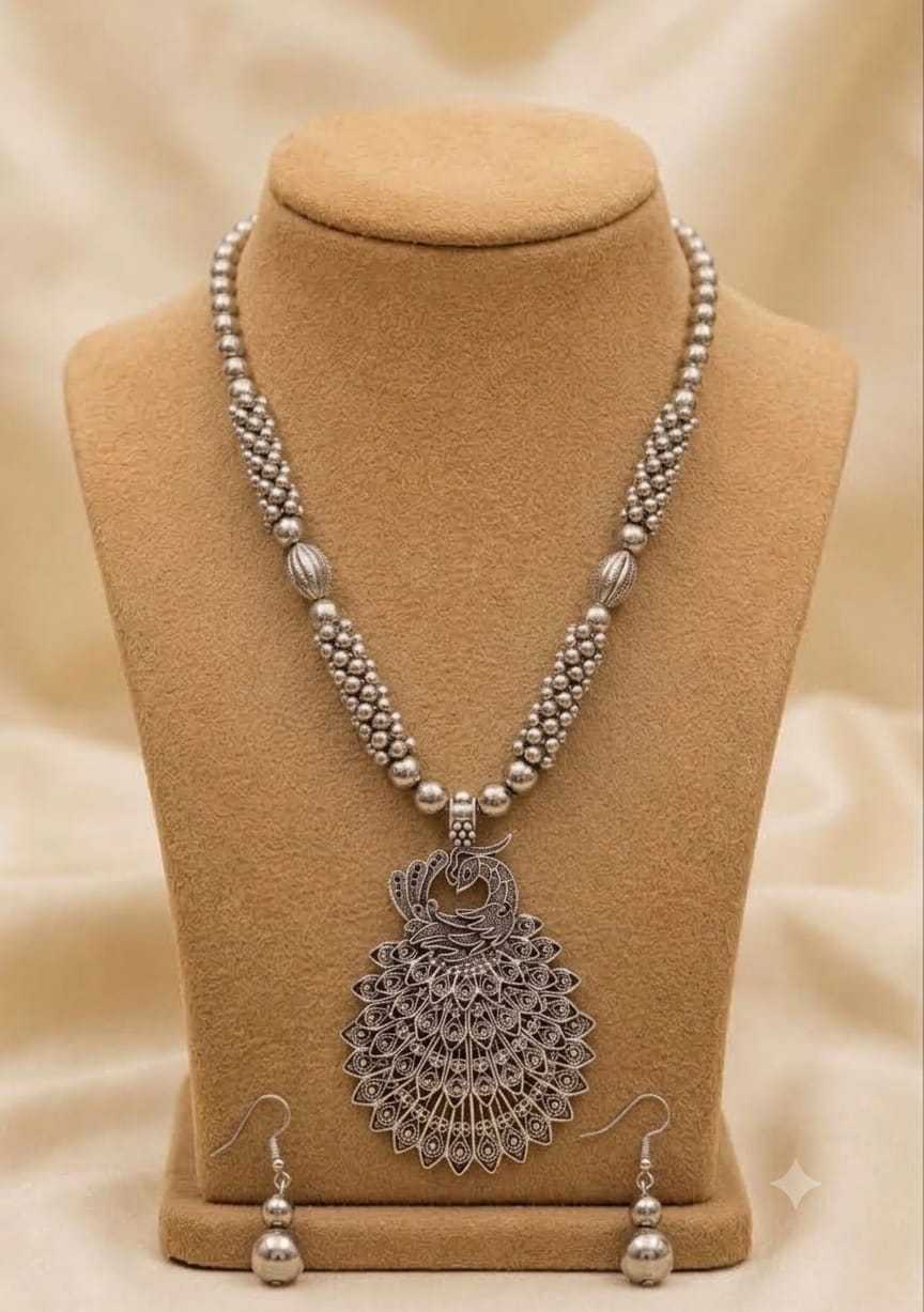 Oxidised Beaded Long Pendant Set with Peacock and Radha Krishna Motifs