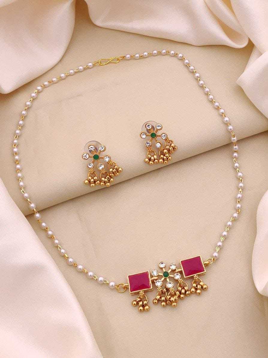 Pearl Strand Necklace with Ruby Square Stones and Ghungroo Studs
