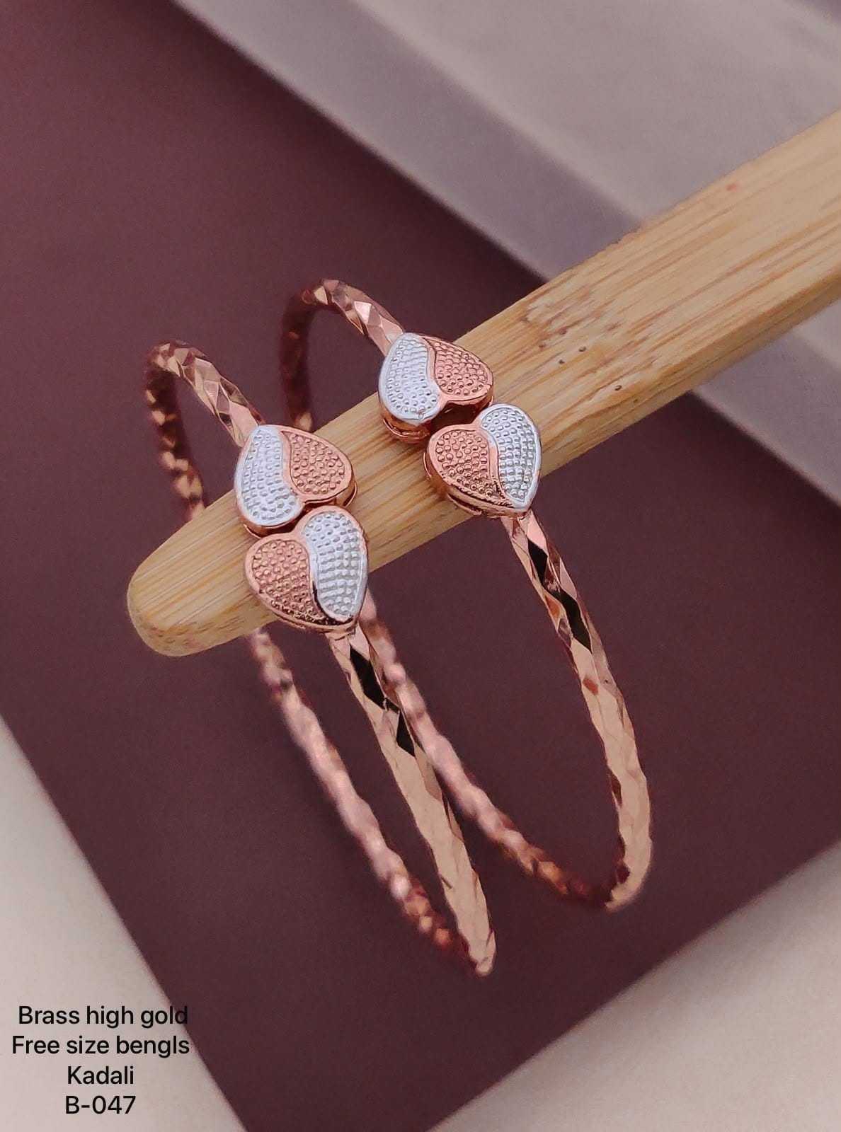 Rose Gold Twisted Band Bangles with Heart Motifs