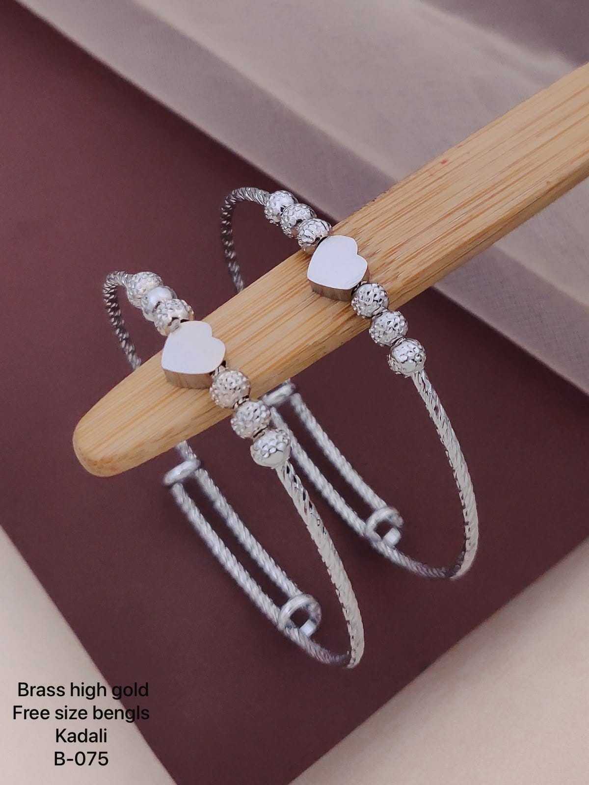 Rose Gold Twisted Band Bangles with Heart Motifs