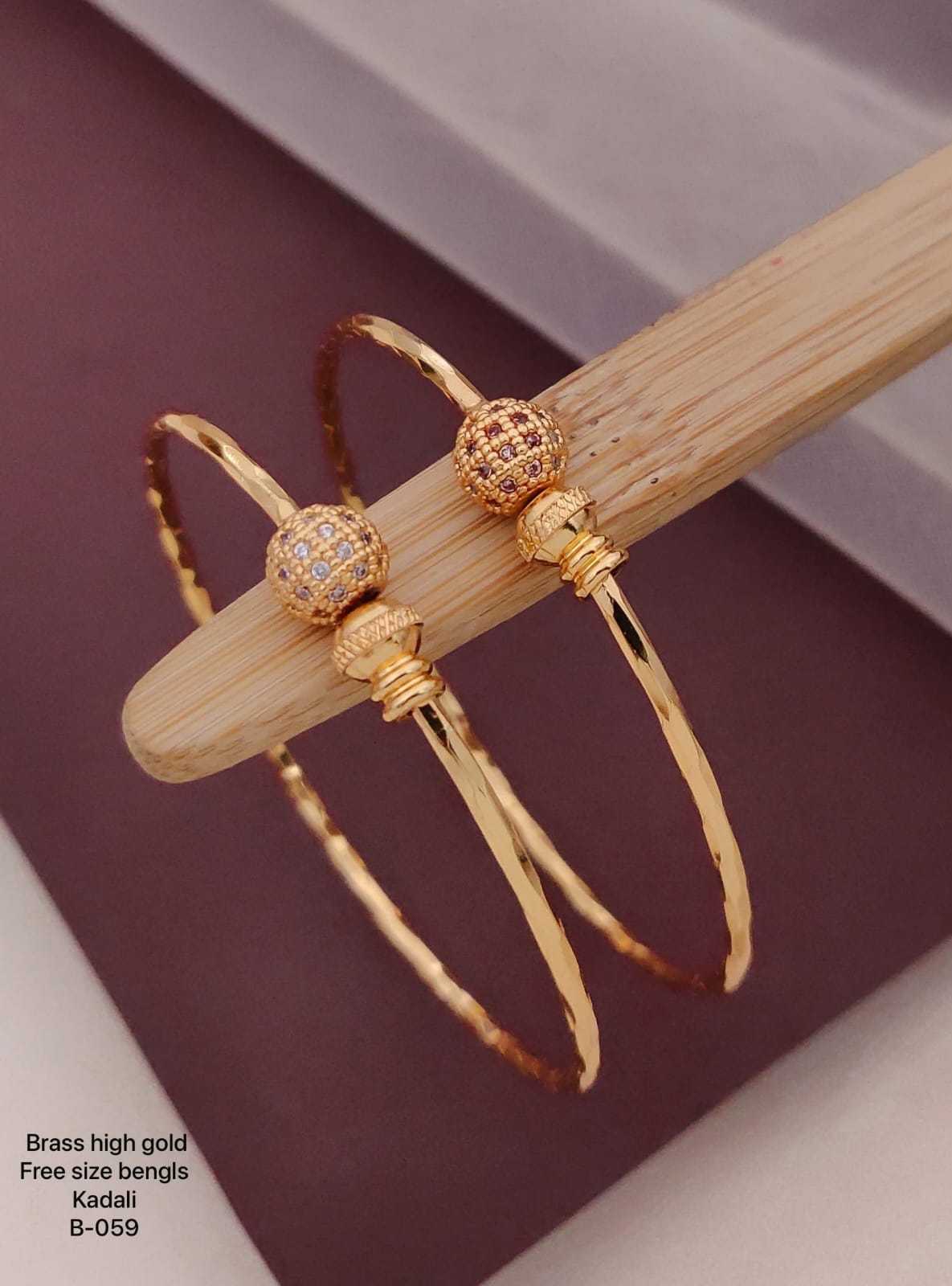 Rose Gold Twisted Band Bangles with Heart Motifs