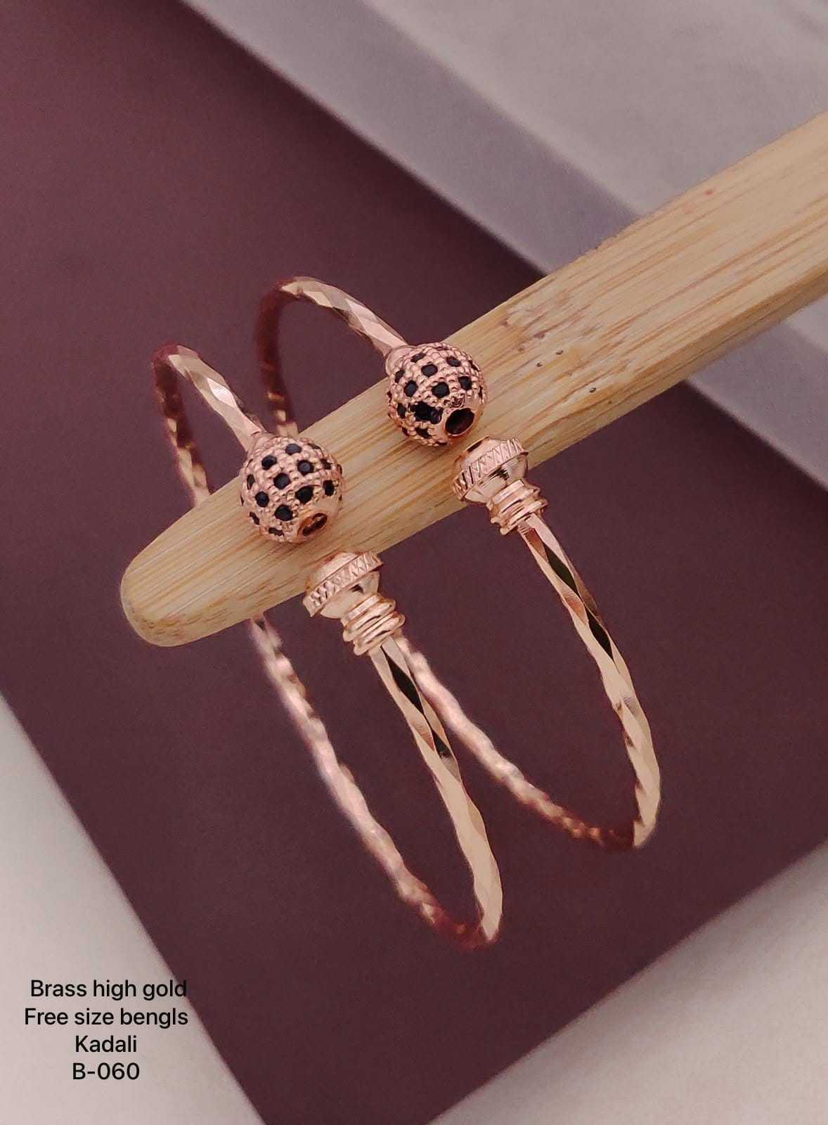 Rose Gold Twisted Band Bangles with Heart Motifs