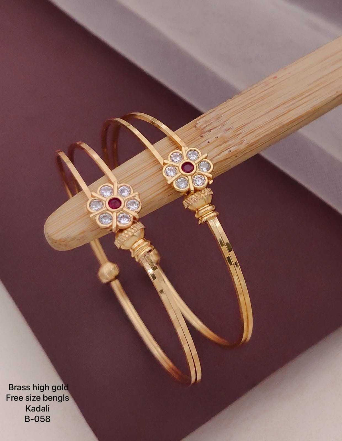Rose Gold Twisted Band Bangles with Heart Motifs