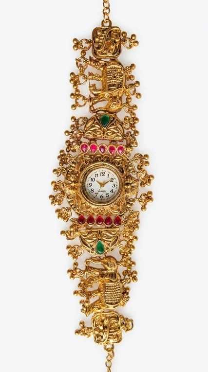 Royal Carved Elephant Watch with Ruby Bezel