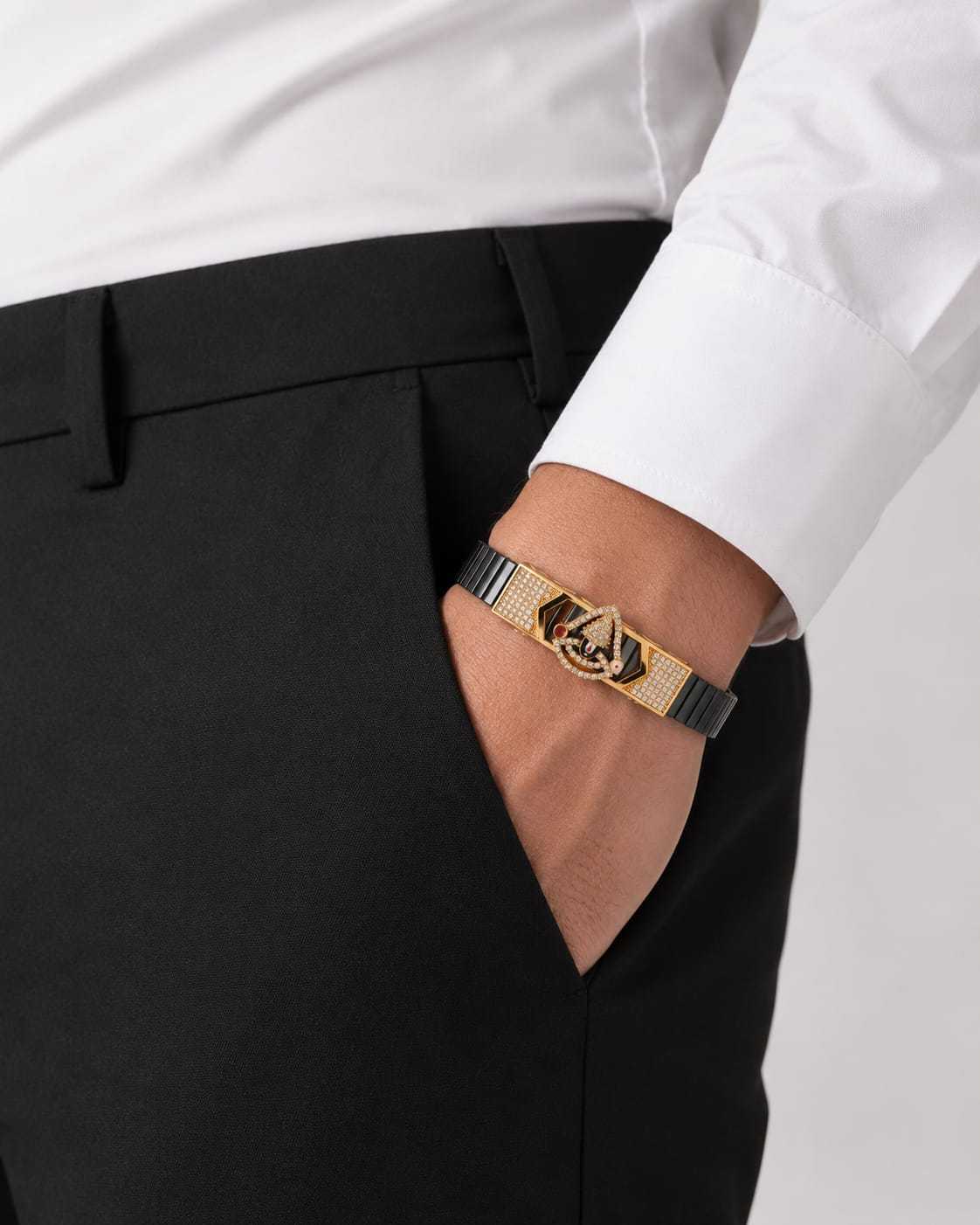 Balaji bracelet worn on a man's wrist