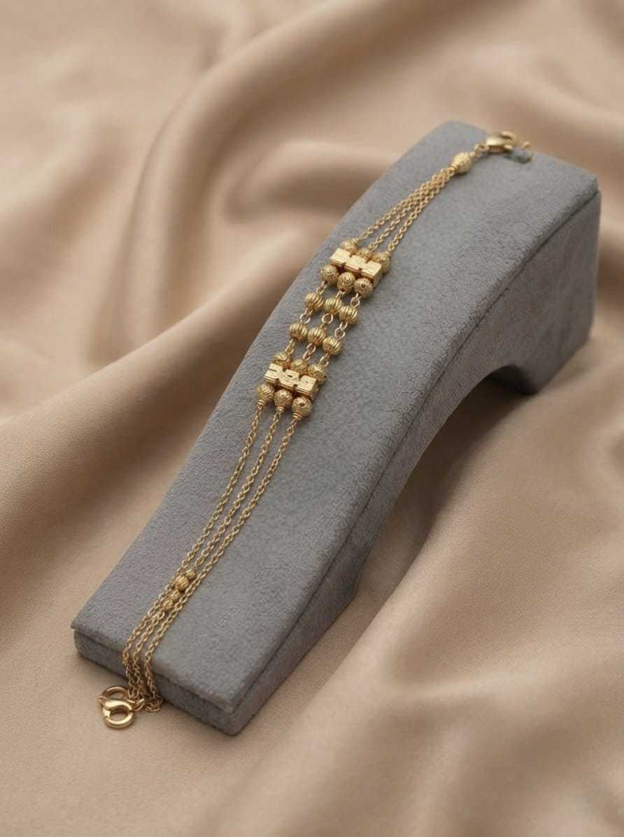 Triple Strand Bracelet with Gold Bead Stations