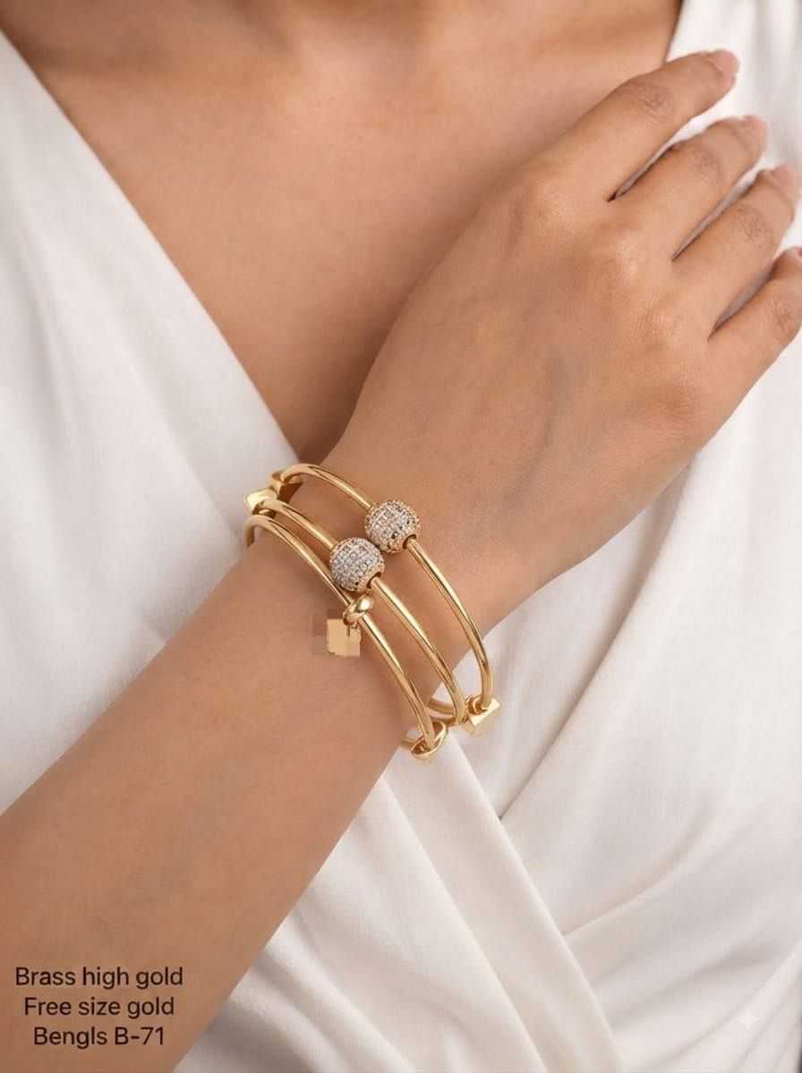 Twisted Shank Bangles with Stone Paved Ball